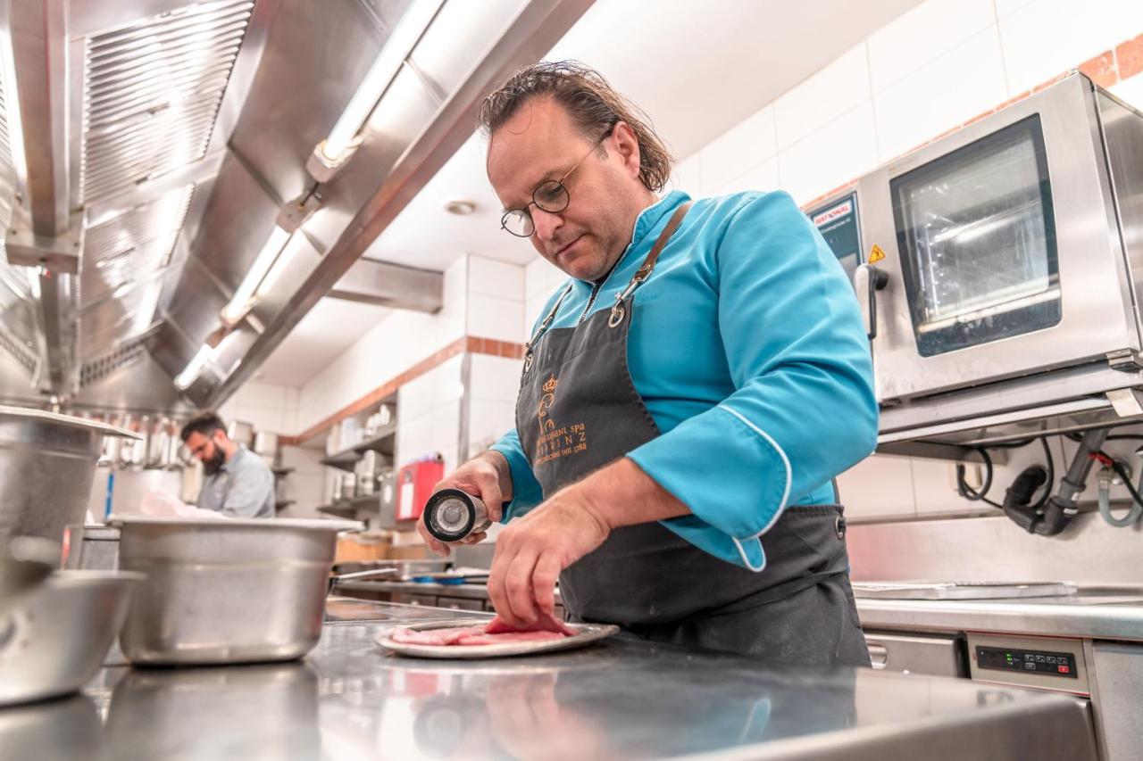 Hotel-Restaurant Erbprinz Ettlingen Exterior photo Chef preparing a dish